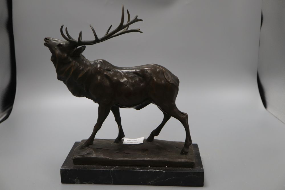 A bronze stag, signed Milo, on marble base, height 31cm